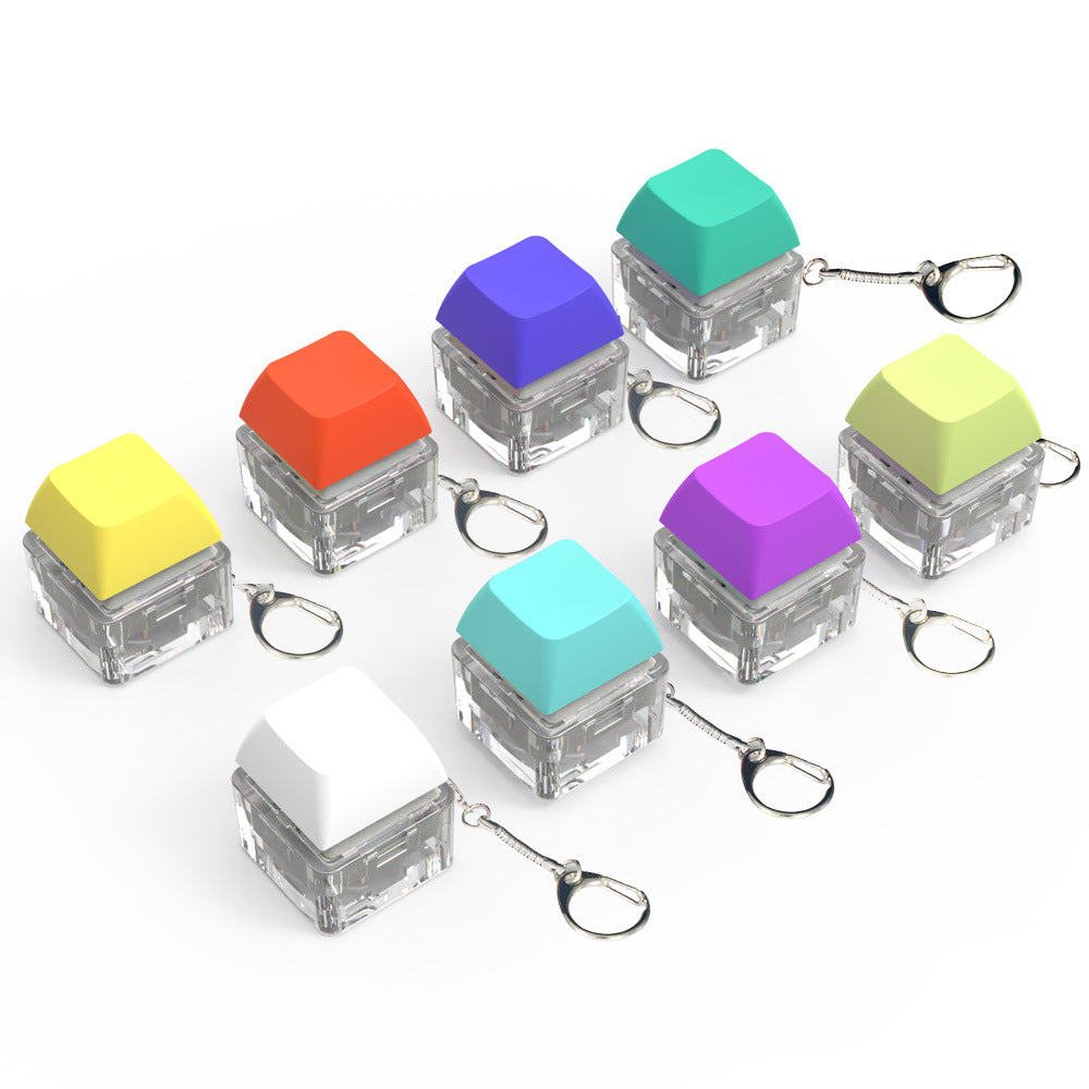 Wholesale ABS Random Luminous Fingertip Pressure Reducing Axle Tester Key Cap Pendant Mechanical Key Fidget Keychains